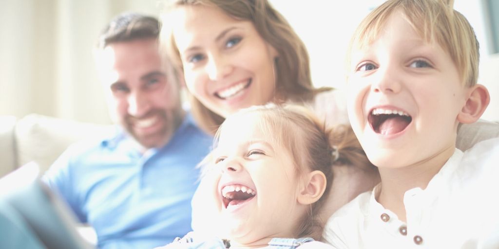 image of a happy family - getting through the fear of having kids